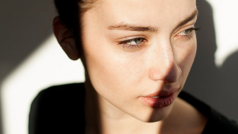 Closeup of woman looking to left