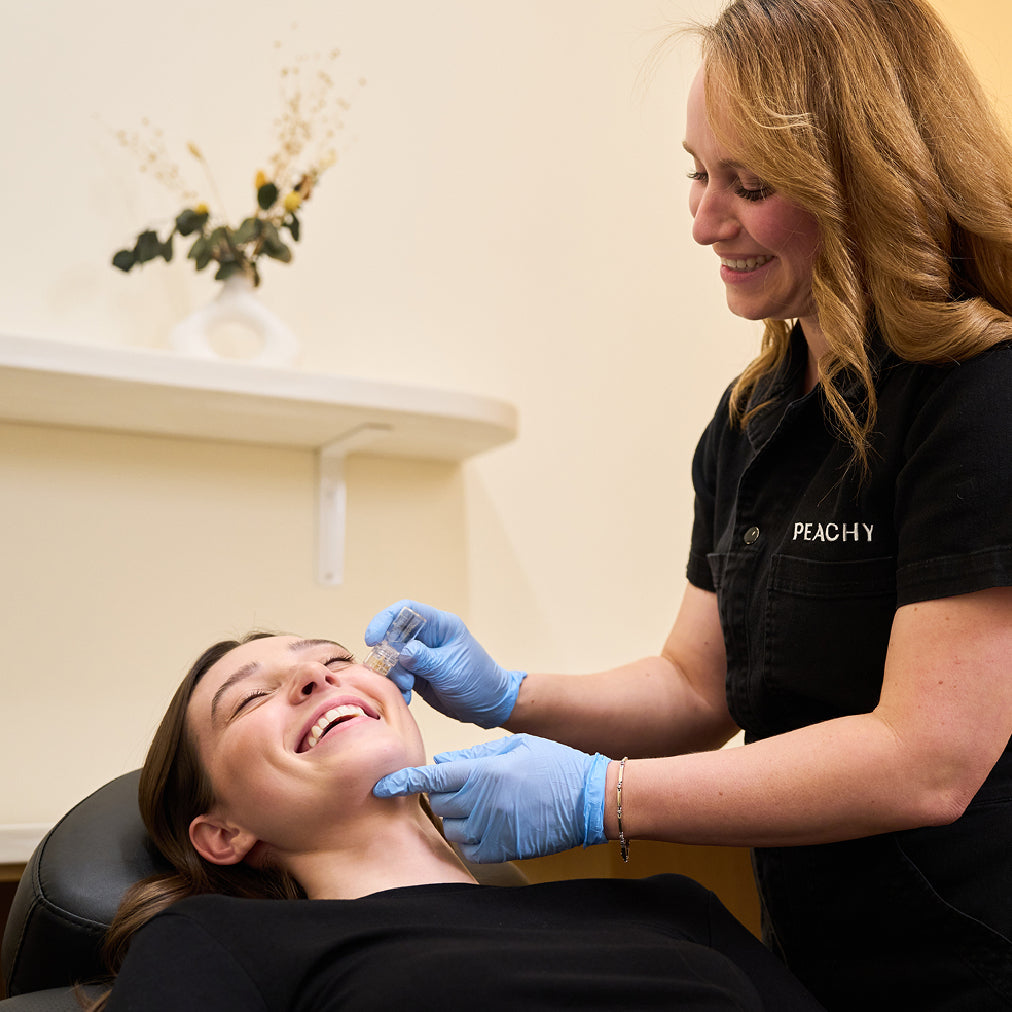 Person receiving facial botox treatment