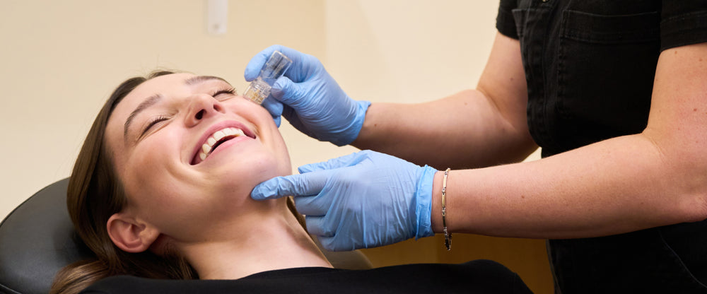 client receiving Botox facial treatment