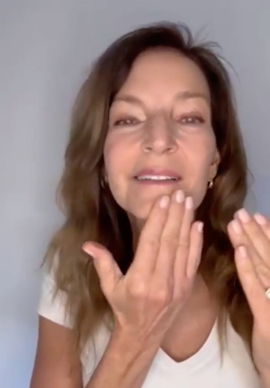 Woman touching her chin