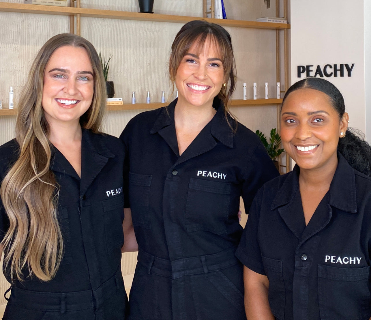 Three smiling Peachy providers